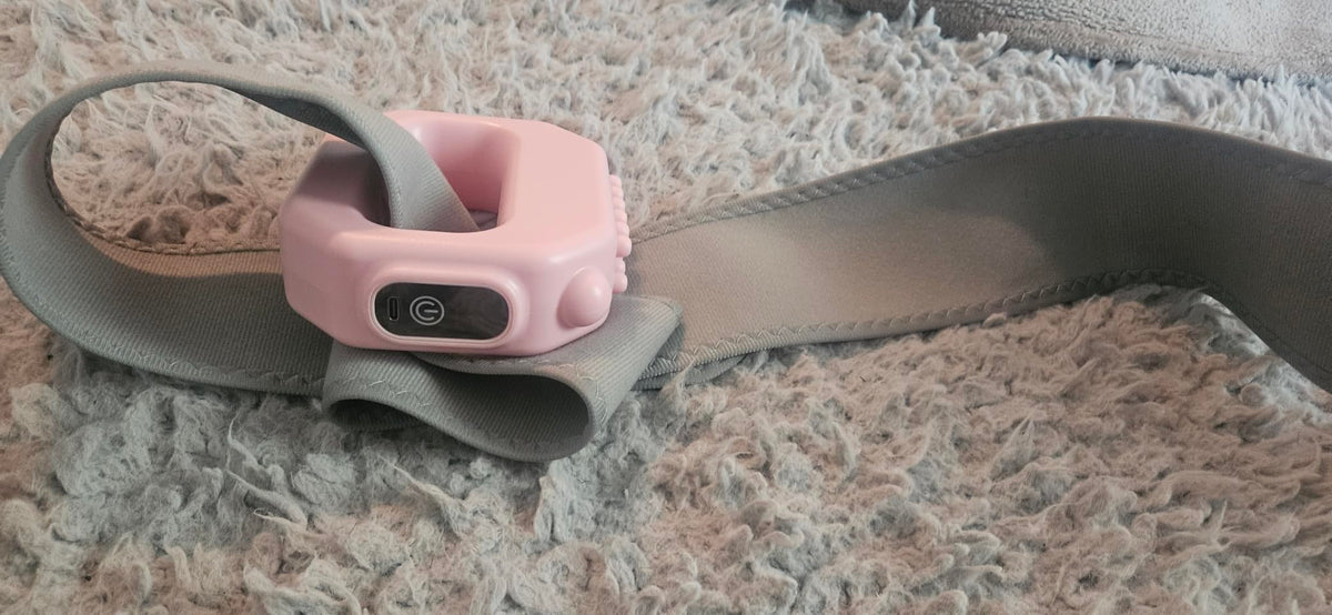 Pink Vellora Fascia Ring photographed with its grey adjustable strap